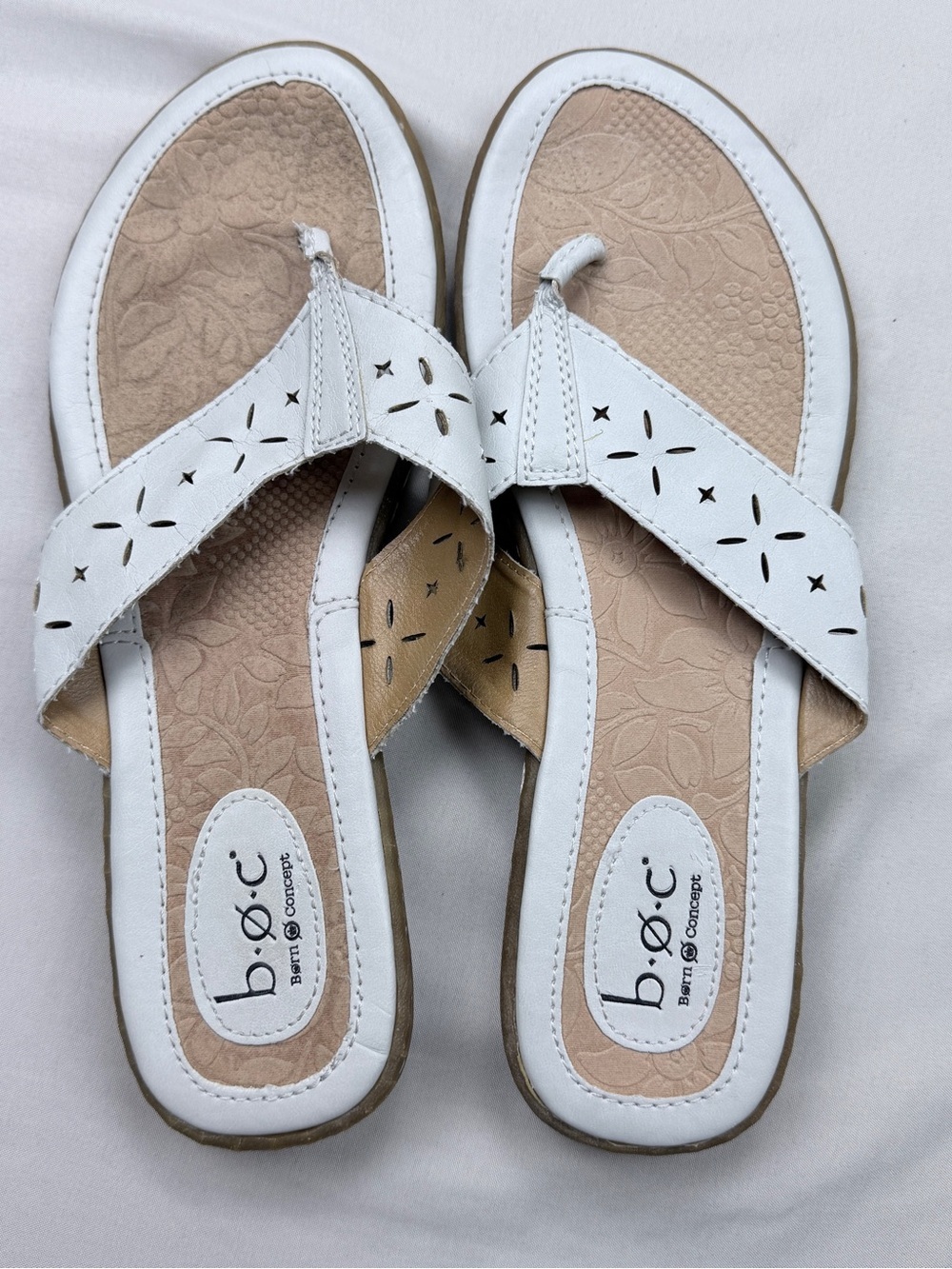 b.o.c. White Laser-Cut Thong Sandals with Floral Footbed